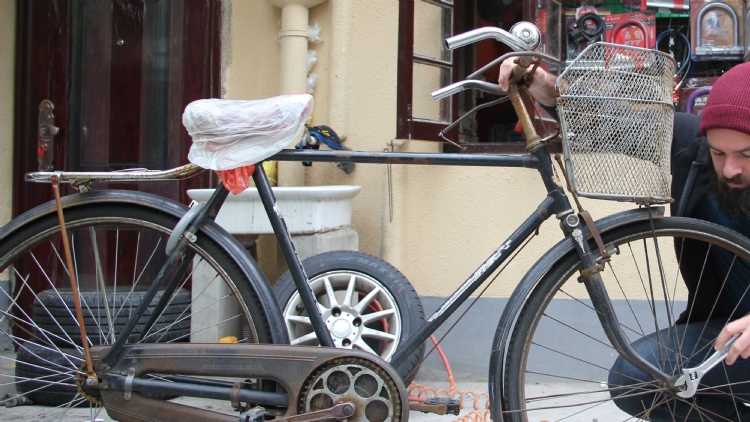 Inside Job: Bicycle repairperson