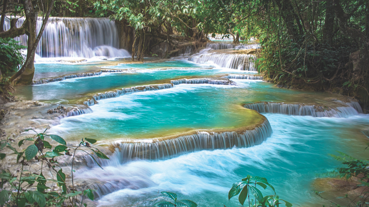 Escape Shanghai: waterfalls and hazy mountains in Luang Prabang, Laos